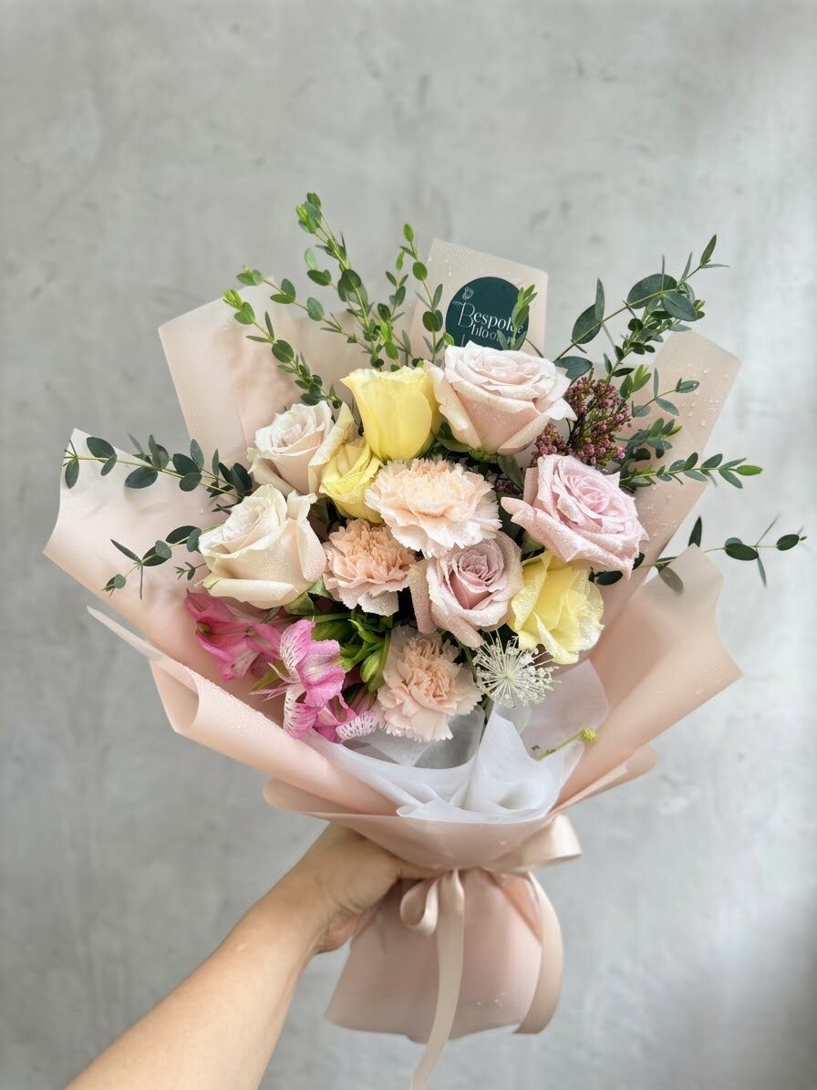 Grasse - pastel roses with alstroemeria and carnations in a blush wrap