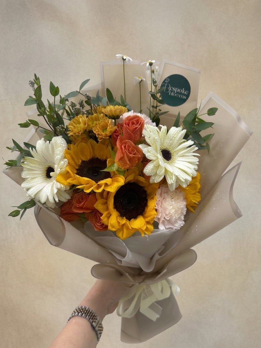 Siena - sunflowers with white gerberas and peach carnations