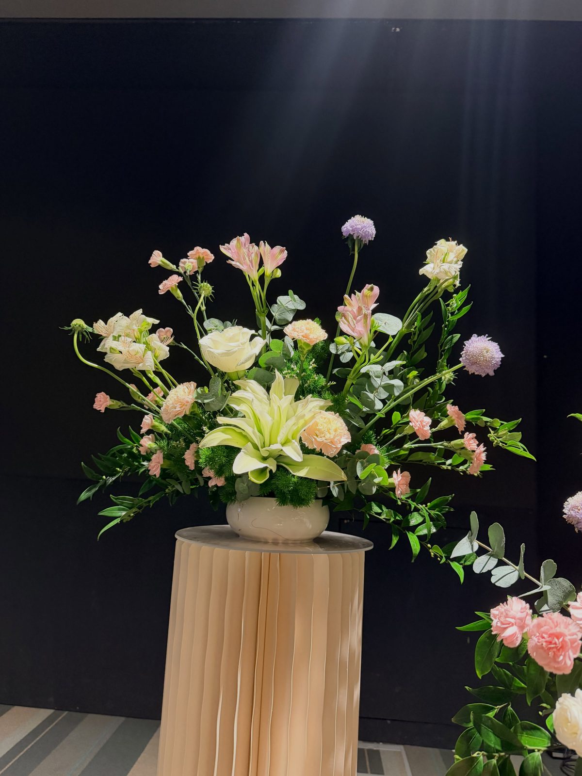 White pedestal arrangement